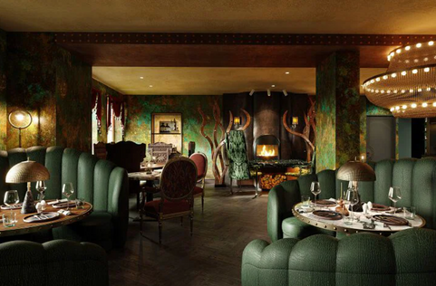 Luxurious restaurant interior with green chairs, tables, and decorative elements.